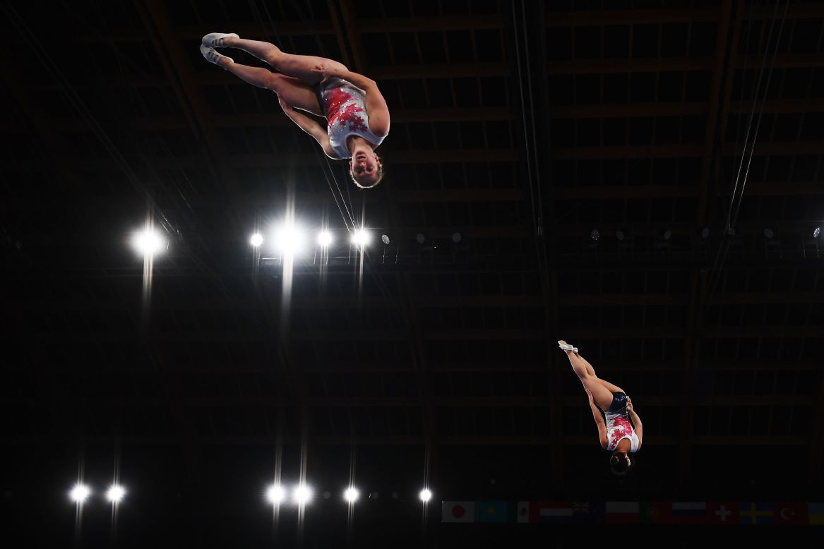 Samantha Smith and Rachel Tam of Canada compete during the World Trampoline Gymnastics Championships at the Ariake Gymnastics Centre in Tokyo on December 1.