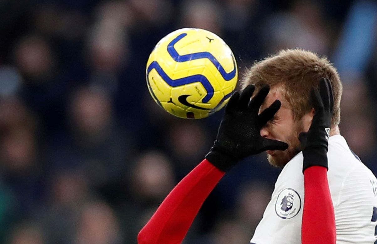 Tottenham Hotspur's Eric Dier goes for the ball in a soccer match against AFC Bournemouth on November 30.