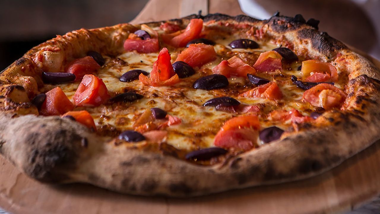 São Paulo-style pizza often bucks Italy's traditions in favor of copious cheese and more daring ingredients.