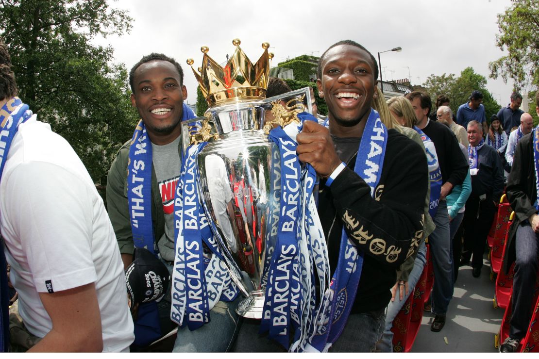 Chelsea's Michael Essien and Shaun Wright Phillips with the Premiership trophy.