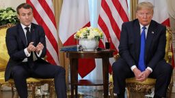 US President Donald Trump (R) France's President Emmanuel Macron react as they talk during their meeting at Winfield House, London on December 3, 2019. - NATO leaders gather Tuesday for a summit to mark the alliance's 70th anniversary but with leaders feuding and name-calling over money and strategy, the mood is far from festive. (Photo by ludovic MARIN / various sources / AFP) (Photo by LUDOVIC MARIN/AFP via Getty Images)