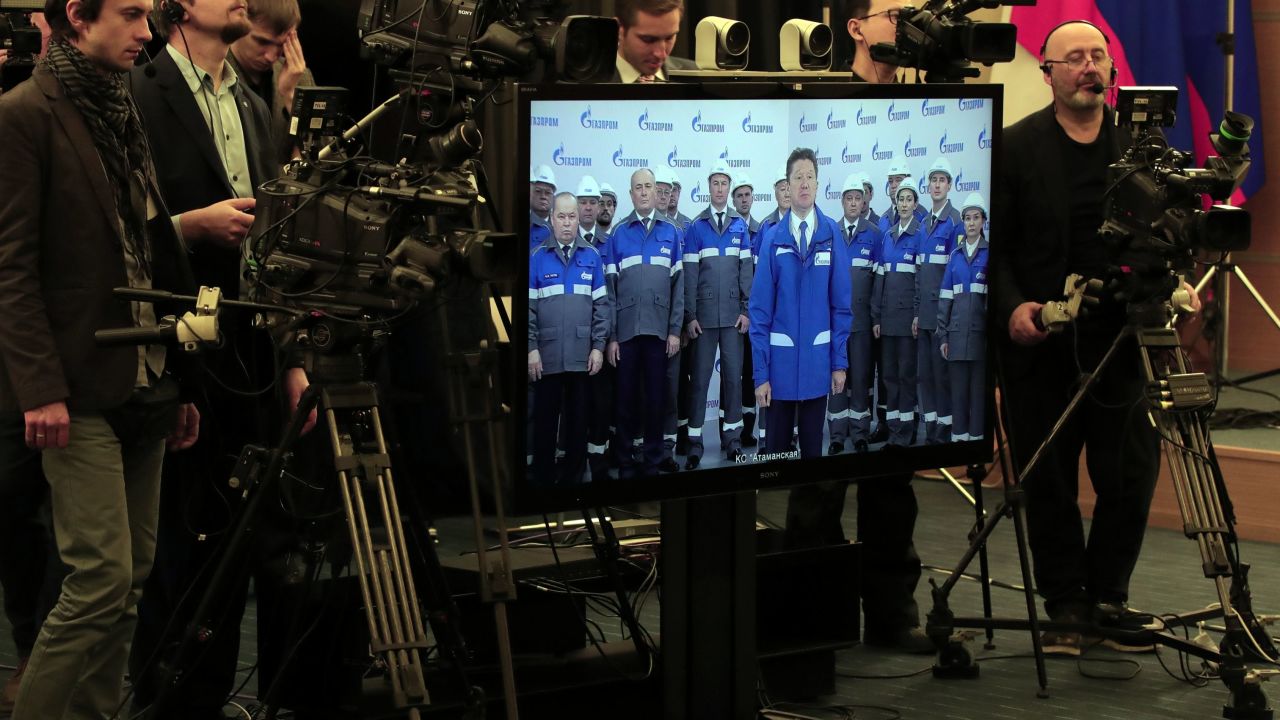 A screen shows Alexei Miller, head of Russia's gas giant Gazprom, as Russian President Vladimir Putin takes part in a ceremony inaugurating the "Power of Siberia" pipeline via a video link in Sochi on December 2.
