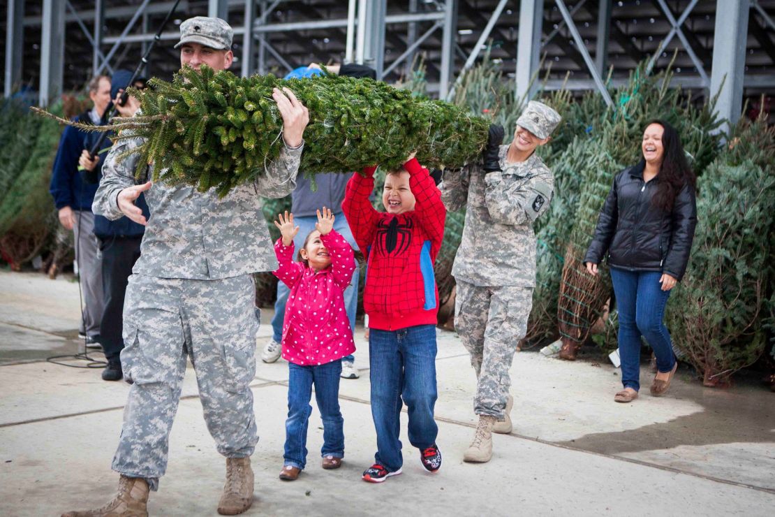 Many volunteers help Trees for Troops deliver the Christmas trees.