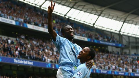 Wright-Phillips celebrates scoring a goal with teammate Robinho.
