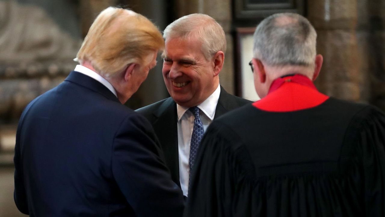 Prince Andrew, Duke of York smiles and shakes hands with US President Donald Trump during the visit to Westminster Abbey on June 03, 2019 in London, England.