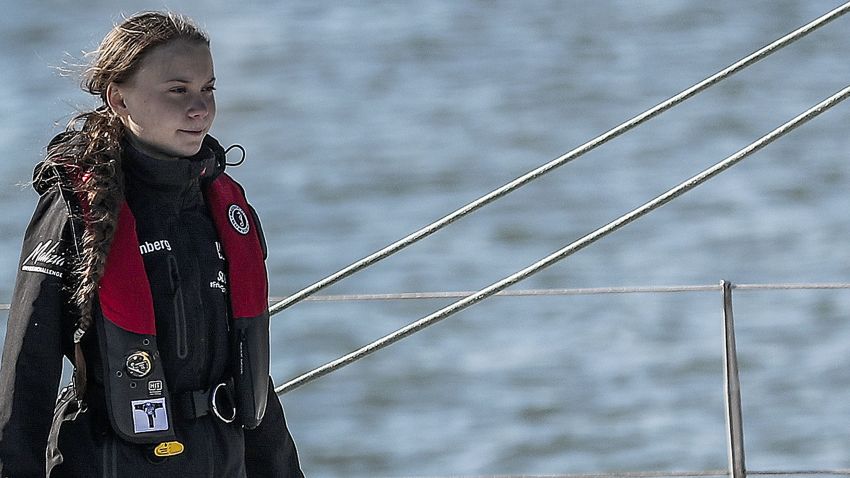 Swedish climate activist Greta Thunberg arrives at the Santo Amaro docks in Lisbon onboard the catamaran La Vagabonde, on December 3, 2019. (Photo by CARLOS COSTA / AFP) (Photo by CARLOS COSTA/AFP via Getty Images)