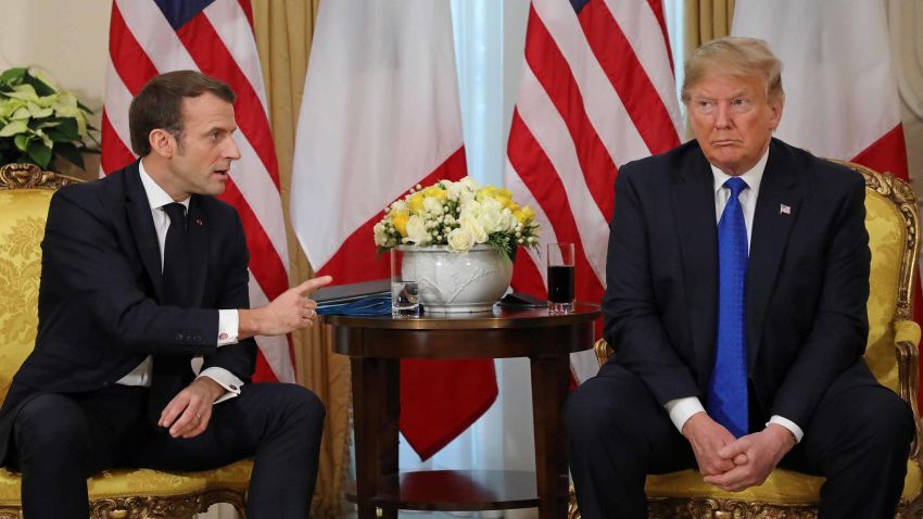 US President Donald Trump (R) France's President Emmanuel Macron react as they talk during their meeting at Winfield House, London on December 3, 2019. - NATO leaders gather Tuesday for a summit to mark the alliance's 70th anniversary but with leaders feuding and name-calling over money and strategy, the mood is far from festive. (Photo by ludovic MARIN / various sources / AFP) (Photo by LUDOVIC MARIN/AFP via Getty Images)