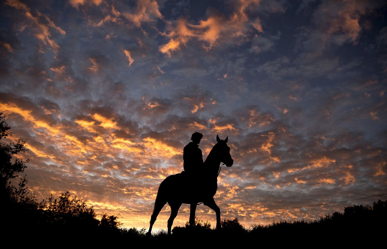Multi award-winning snapper Edward Whitaker was named horse racing's photographer of the year for his portfolio of six stunning pictures. The first was taken at dawn before morning exercise at Philip Hobbs' yard, on the west coast of England. "I got there and saw this amazing sky, I could see what was going to happen but I just needed a horse," Whitaker told CNN Sport. 