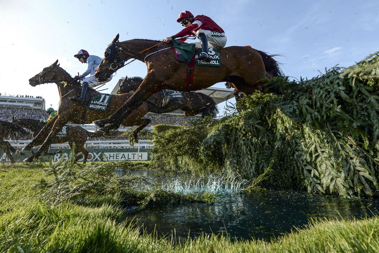 This picture of two-time Grand National winner Tiger Roll jumping to success for the second time is one of his favorites. The photograph was taken remotely but Whitaker credits the birch hitting to water for "bringing it to life". 