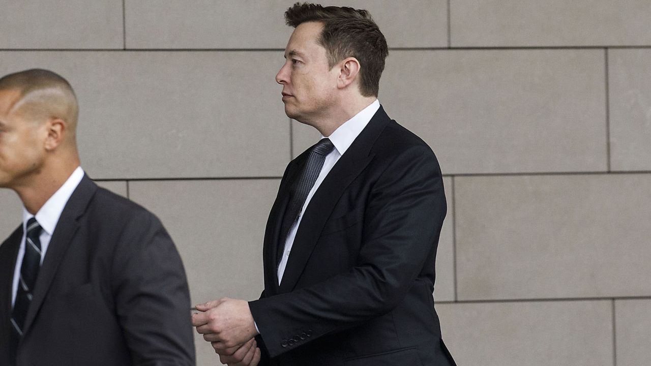 Elon Musk, chief executive officer of Tesla Inc., arrives at federal court in Los Angeles, California, U.S., on Tuesday, Dec. 3, 2019. Musk will have to go before a federal jury and defend calling a British caver a "pedo guy." Photographer:
