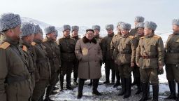 This undated picture released from North Korea's official Korean Central News Agency (KCNA) on December 4, 2019 shows North Korean leader Kim Jong Un (C) visiting battle sites at Mount Paektu, Ryanggang.
