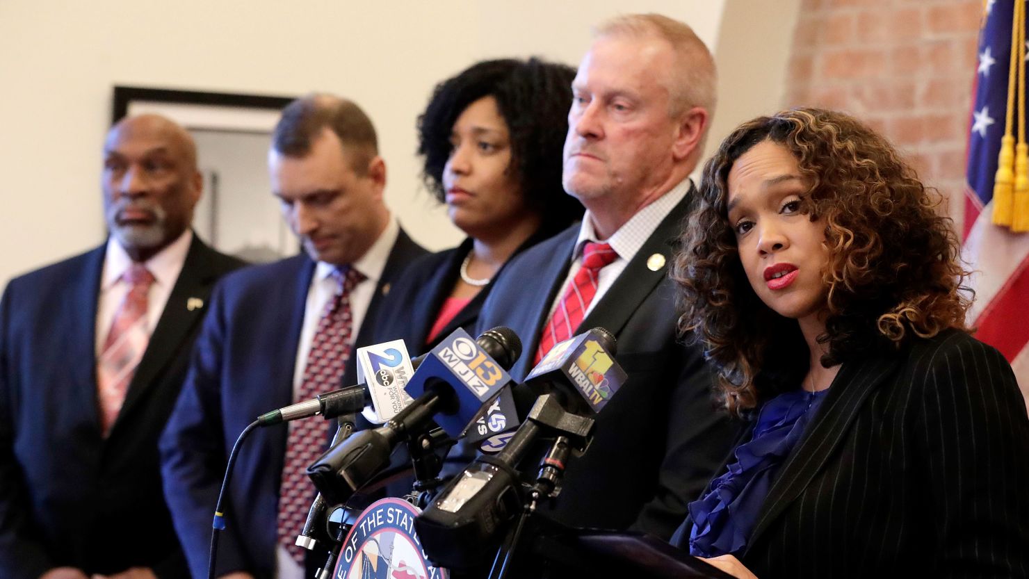 Baltimore City State's Attorney Marilyn Mosby, right, speaks during a news conference announcing the indictment of 25 corrections officers.