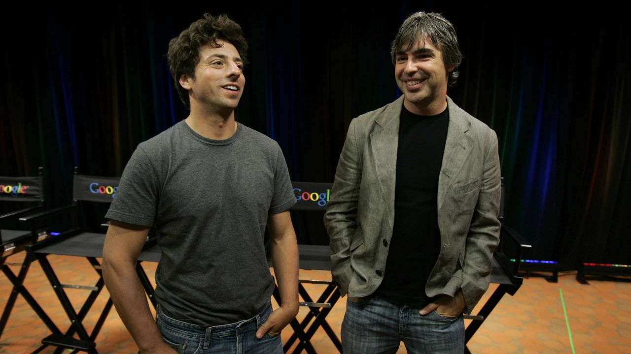 FILE - In this Sept. 2, 2008, file photo Google co-founders Sergey Brin, left, and Larry Page talk about the new Google Browser, "Chrome," during a news conference at Google Inc. headquarters in Mountain View, Calif. Page and Brin are stepping down from their roles within the parent company, Alphabet. Page, who had been serving as CEO of Alphabet, and Brin, who had been president of Alphabet, will remain on the board of the company. (AP Photo/Paul Sakuma, File)