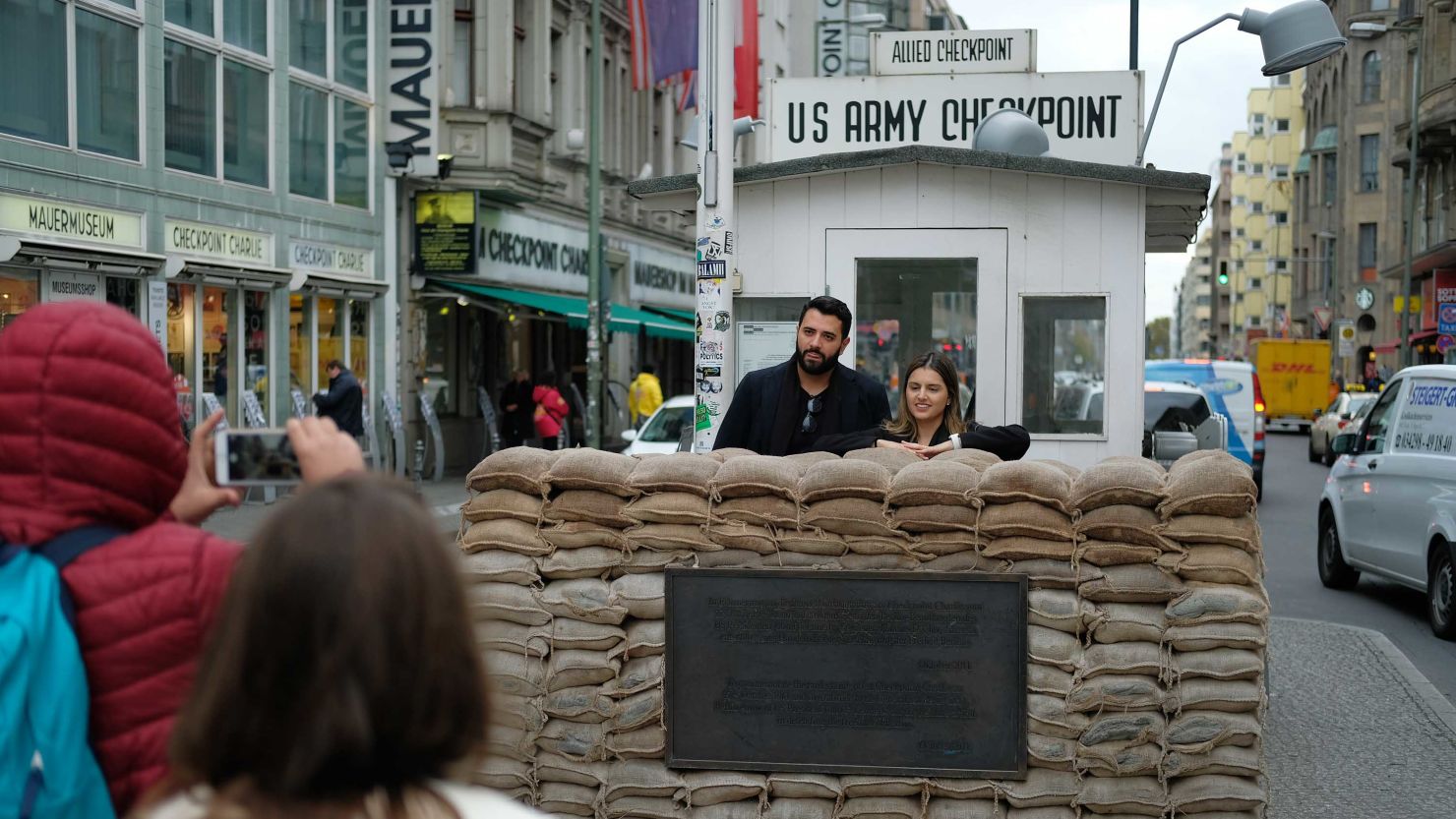 Checkpoint Charlie has become a major tourist attraction since the fall of the Berlin Wall in 1989.