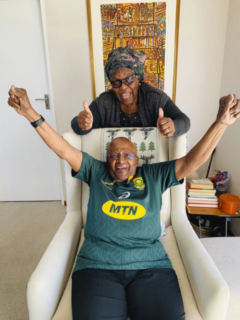 Tutu and his wife, Leah, show their support for South Africa's rugby team in this photo taken in October 2019. South Africa went on to win the Rugby World Cup.
