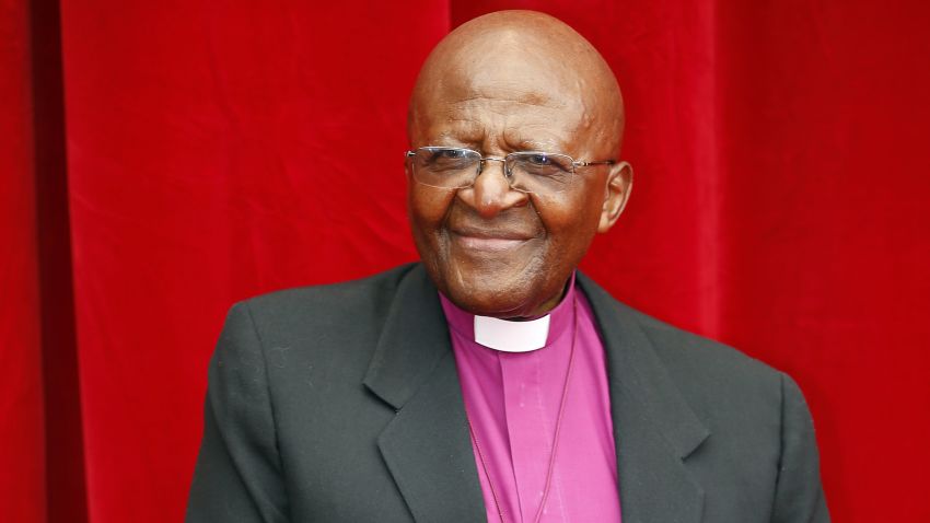 South African Archbishop and Nobel peace laureate Desmond Tutu poses as he arrives for a photocall for the documentary "Children of the Light" as part of the 54st Monte-Carlo Television Festival on June 8, 2014 in Monaco.   AFP PHOTO / VALERY HACHE        (Photo credit should read VALERY HACHE/AFP via Getty Images)