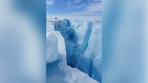 After draining, lakes leave behind holes called "moulins," which allow meltwater to continue to travel to the bottom of the ice sheet.