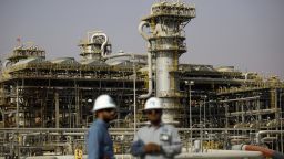 Employees visit the Natural Gas Liquids (NGL) facility at Saudi Aramco's Shaybah oil field in the Rub' Al-Khali desert, also known as the 'Empty Quarter,' in Shaybah, Saudi Arabia, on Tuesday, Oct. 2, 2018. Saudi Arabia is seeking to transform its crude-dependent economy by developing new industries, and is pushing into petrochemicals as a way to earn more from its energy deposits. Photographer: Simon Dawson/Bloomberg via Getty Images