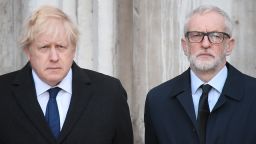 Britain's Prime Minister Boris Johnson (L) and opposition Labour party leader Jeremy Corbyn take part in a vigil at the Guildhall in central London to pay tribute to the victims of the London Bridge terror attack on December 2, 2019. (Photo by DANIEL LEAL-OLIVAS / AFP) (Photo by DANIEL LEAL-OLIVAS/AFP via Getty Images)