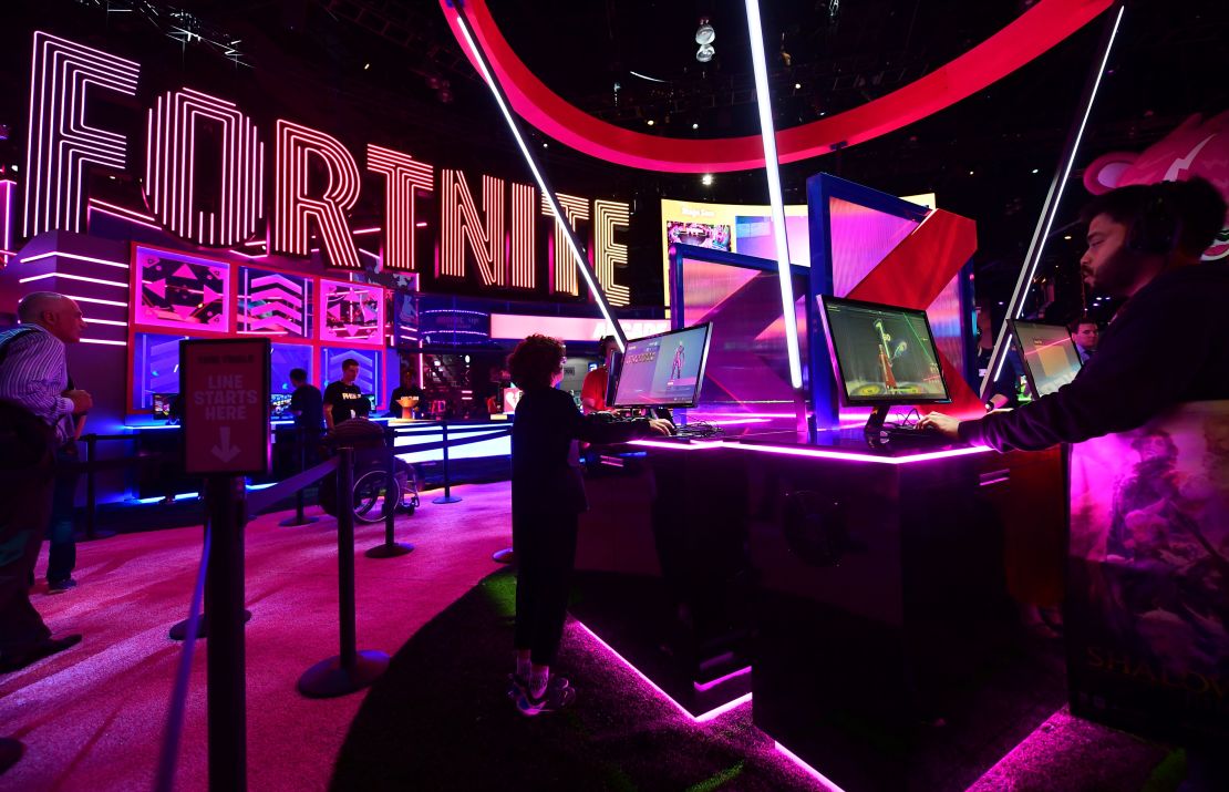 Gaming fans play Fortnite at the 2019 Electronic Entertainment Expo opening in Los Angeles, California on June 11, 2019. 