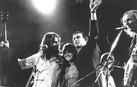 "I was painfully unprepared to be a solo act," Ronstadt writes in her memoir. "We had relied on Kimmel to write the songs, and I had no repertoire of my own." She began to experiment with the songs she'd sung as a kid and sought more musicians to work with - including the basis of what would become The Eagles, pictured here with Ronstadt and California Gov. Jerry Brown, whom Ronstadt famously dated. 