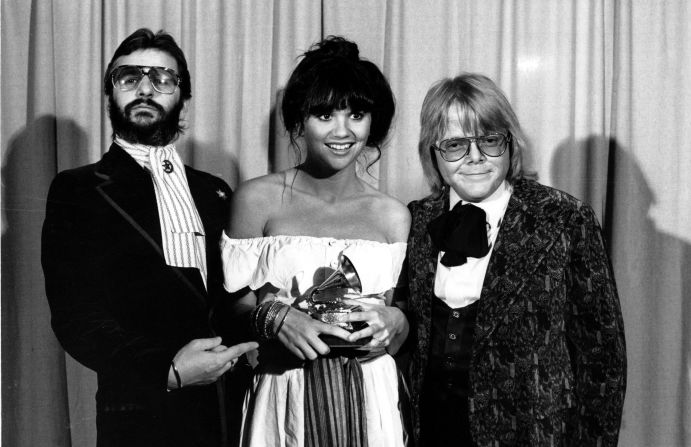 Ronstadt released four solo albums between 1969 and 1973, but it wasn't until 1974's "Heart Like A Wheel" that the singer collected her first Grammy Award, along with two No. 1 hits. Both "You're No Good," her take on Clint Ballard Jr.'s 1963 original, and her version of The Everly Brothers' "When Will I Be Loved," climbed to the top of Billboard's pop and country charts, respectively. Ronstadt, seen here with Ringo Starr (left) and Paul Williams, picked up a second golden gramaphone for her 1976 album "Hasten Down the Wind."