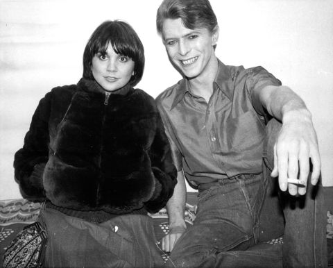 At the dawn of the 1980s, Ronstadt was at the top of her game. "Linda was the queen," Bonnie Raitt says in CNN Films' documentary on the singer. "She was like what Beyonce is now." Ronstadt is pictured here backstage with David Bowie in 1980. 