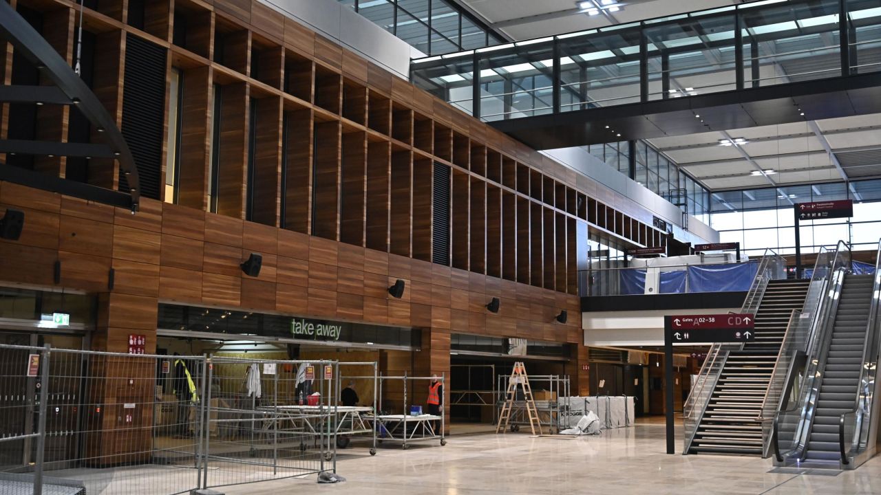 Work was ongoing during a press preview on November 25 at the long-awaited Berlin Brandenburg airport.