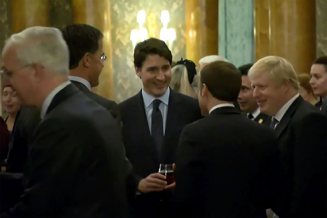 This grab made from a video shows Dutch Prime Minister Mark Rutte (L), French President Emmanuel Macron (front),  British Prime Minister Boris Johnson (R) and Canada's Prime Minister Justin Trudeau (back-C) as they were caught on camera at a Buckingham Palace reception appearing to joke about US President Donald Trump's lengthy media appearances ahead of the NATO summit on Tuesday, December 3, in London.