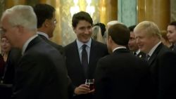 This grab made from a video shows Dutch Prime Minister Mark Rutte (L), French President Emmanuel Macron (front),  British Prime Minister Boris Johnson (R) and Canada's Prime Minister Justin Trudeau (back-C) as the leaders of Britain, Canada, France and the Netherlands were caught on camera at a Buckingham Palace reception appearing to joke about US President Donald Trump's lengthy media appearances ahead of the NATO summit on December 3, 2019 in London.