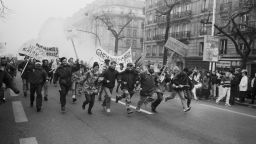 French railway workers take part in a street demonstration during one of a series of general strikes in France, in December 1995.