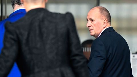 Plaintiff, British cave expert Vernon Unsworth, right, arrives at U.S. District Court Wednesday, Dec. 4, 2019, in Los Angeles. Tesla CEO Elon Musk is going on trial for his troublesome tweets in a case pitting the billionaire against the British diver he allegedly dubbed a pedophile.
