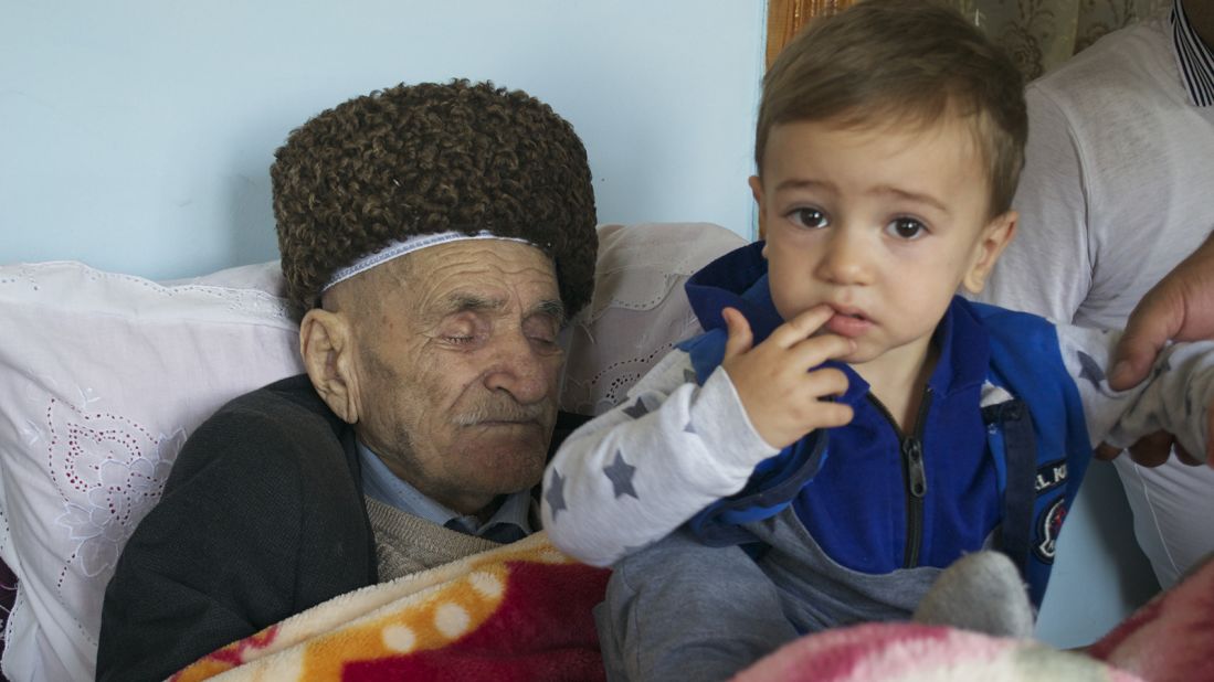 <strong>Bridging generations: </strong>Mammadkhan Abbasov, 103, is pictured with his great grandson. 