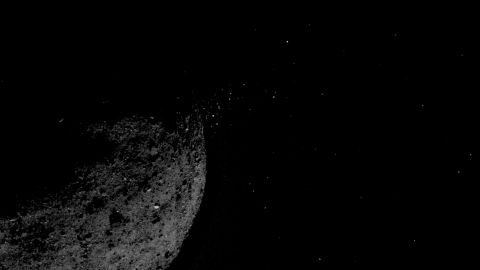 Particles can be seen releasing from the asteroid.