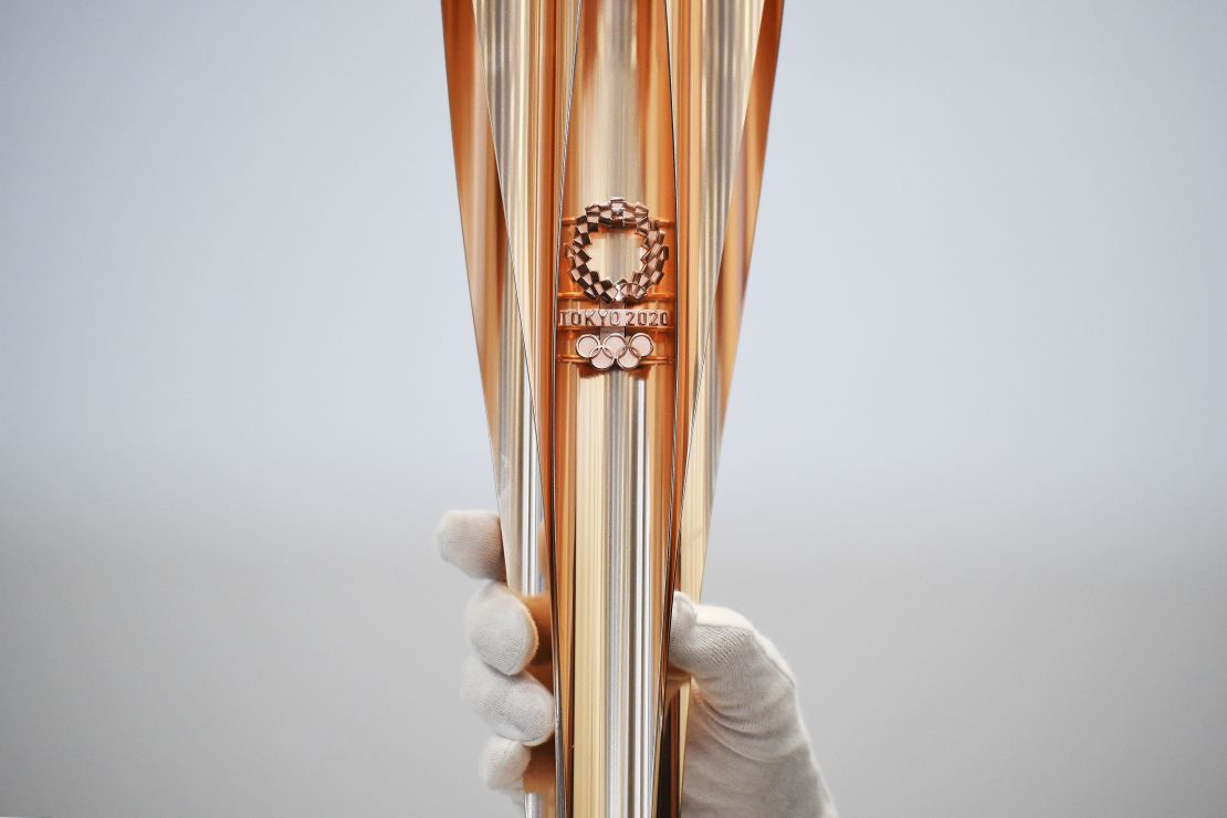 The Tokyo 2020 Olympic Games torch for the torch relay is displayed in Tokyo on March 20, 2019. 