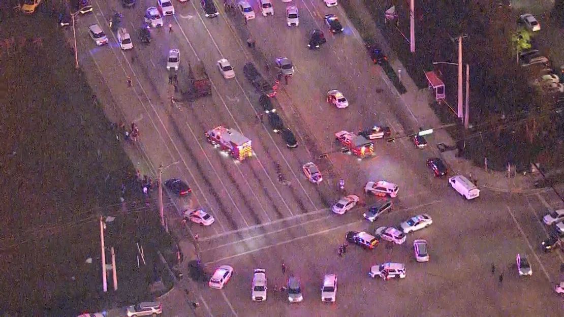 Aerial footage shows law enforcement vehicles sprawled across the Miramar intersection where the shootout took place.