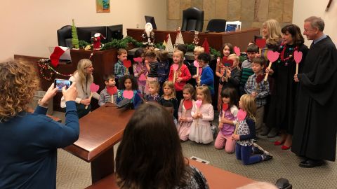 Mrs. McKee's kindergarten class supported their classmate as his adoption was finalized.