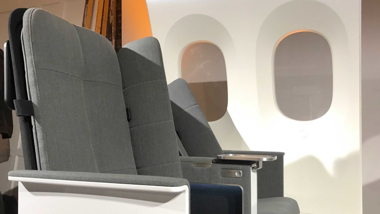 <strong>From design to reality: </strong>Interspace is a seat that includes padded wings that manually fold in and out of the seat. Pictured here at its premiere in December 2019, Interspace went on the market in September 2021. 