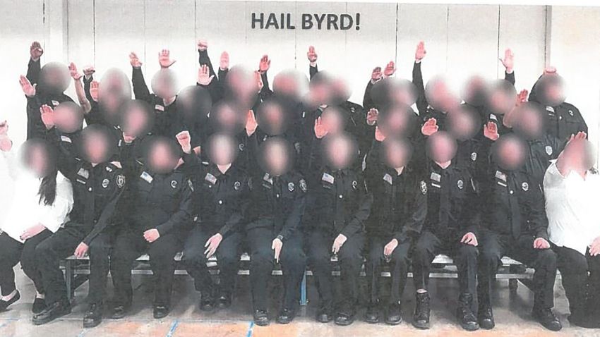 A number of employees of the West Virginia Division of Corrections and Rehabilitation have been suspended surrounding the investigation of a photograph showing a correctional officer training class performing the Nazi salute.