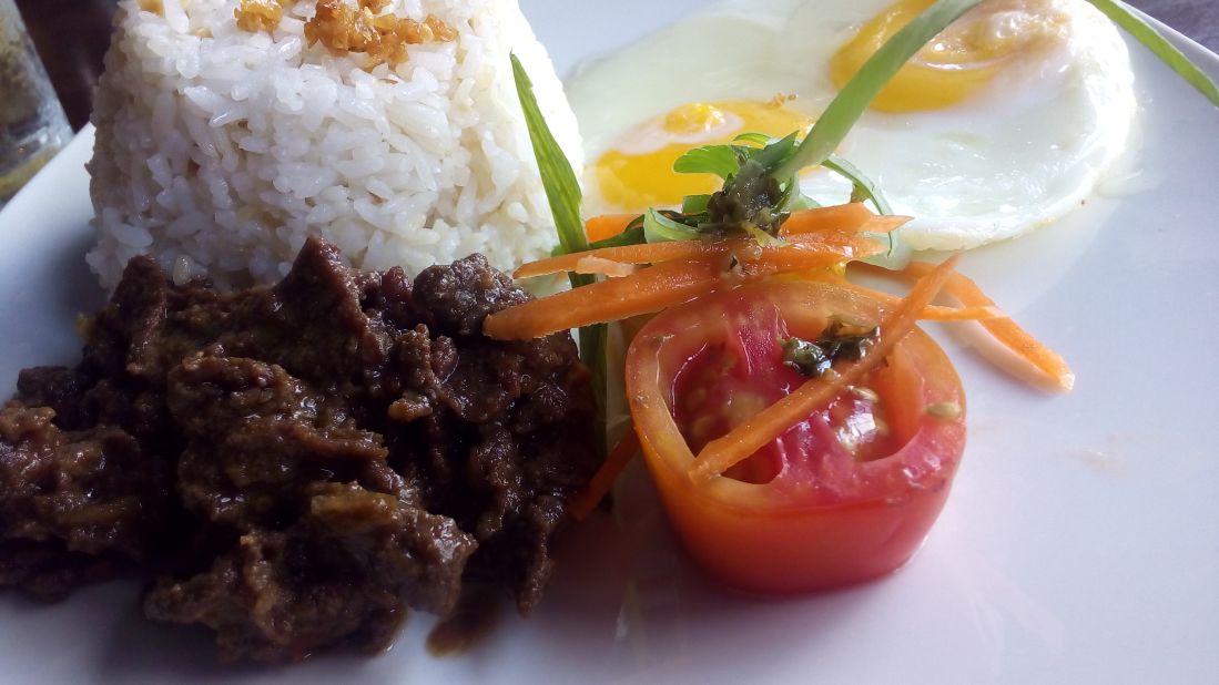 <strong>Tapsilog in Manila: </strong>Cured, semidried or marinated beef with garlic rice and a fried egg is found all over Manila and really hits the spot when a hangover strikes.