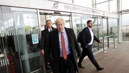 UK Prime Minister Boris Johnson arrives at a train station in Kent while campaigning on Friday.