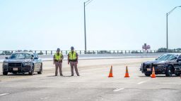 PENSACOLA, FLORIDA - DECEMBER 06: Florida State Troopers block traffic over the Bayou Grande Bridge leading to the Pensacola Naval Air Station following a shooting on December 06, 2019 in Pensacola, Florida. The second shooting on a U.S. Naval Base in a week has left three dead plus the suspect and seven people wounded.  (Photo by Josh Brasted/Getty Images)