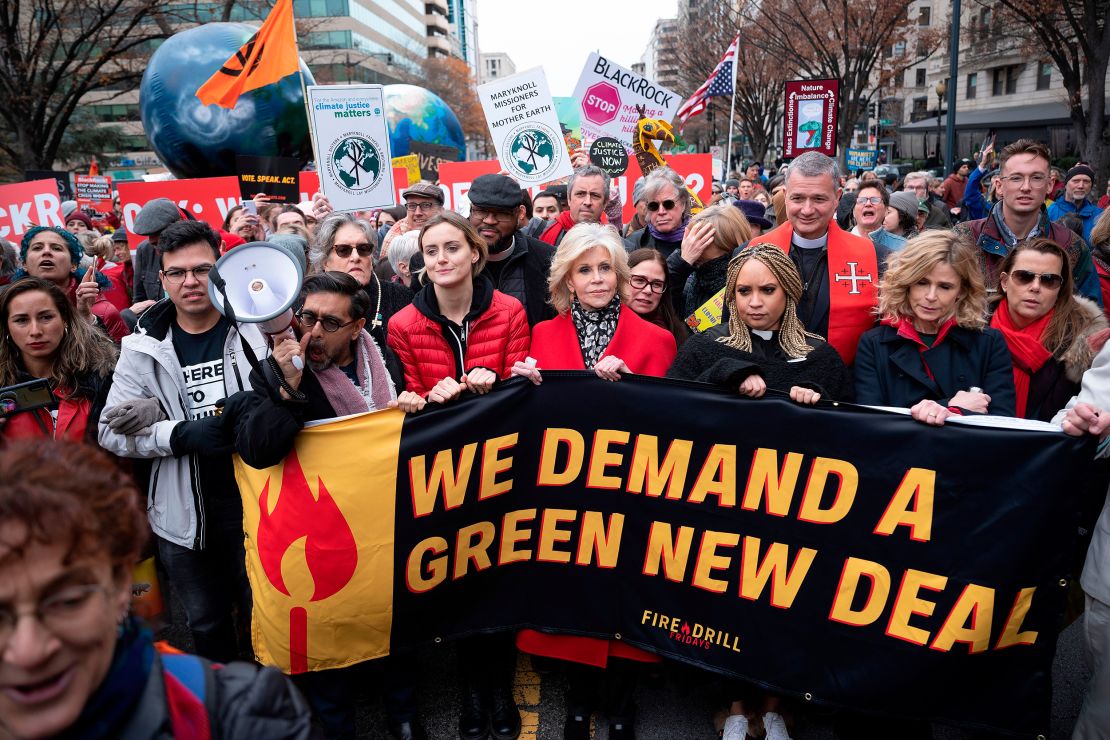 Actress Jane Fonda marches with fellow actresses Taylor Schilling and Kyra Sedgwick