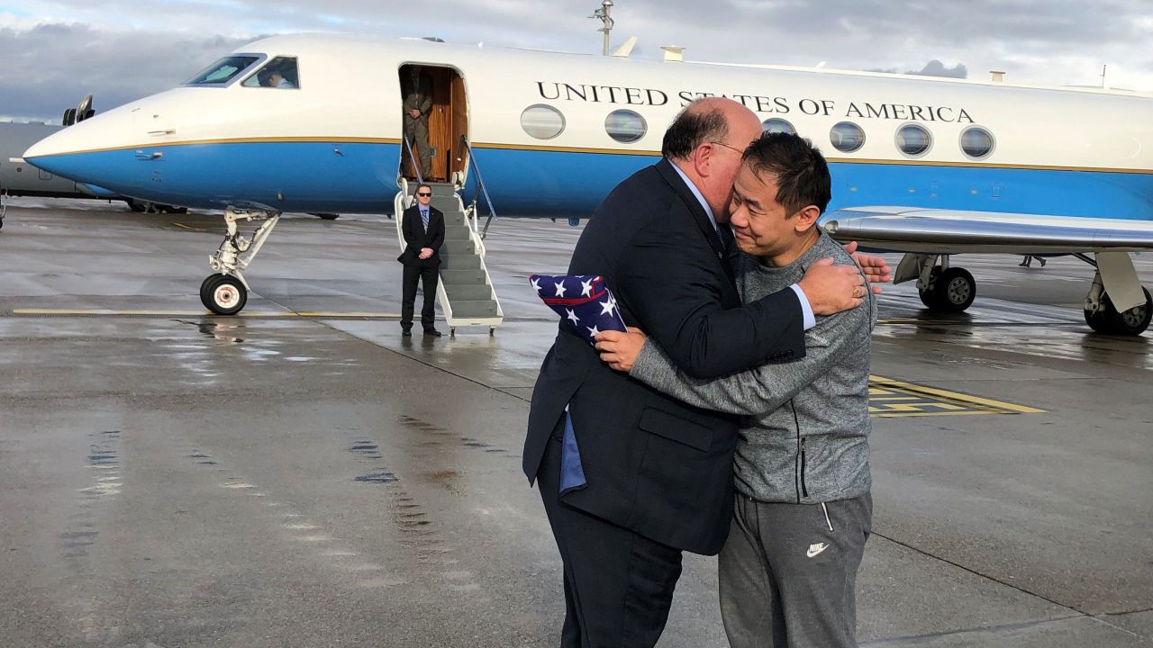 The US Embassy in Switzerland tweeted this photo with the caption, "Amb. McMullen was honored to present the American flag to freed U.S. prisoner Xiyue Wang, who has been held on false charges in Iran for 3 years."