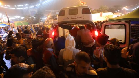An ambulance arrives in Tahrir Square after gunmen opened fire on anti-government protesters.