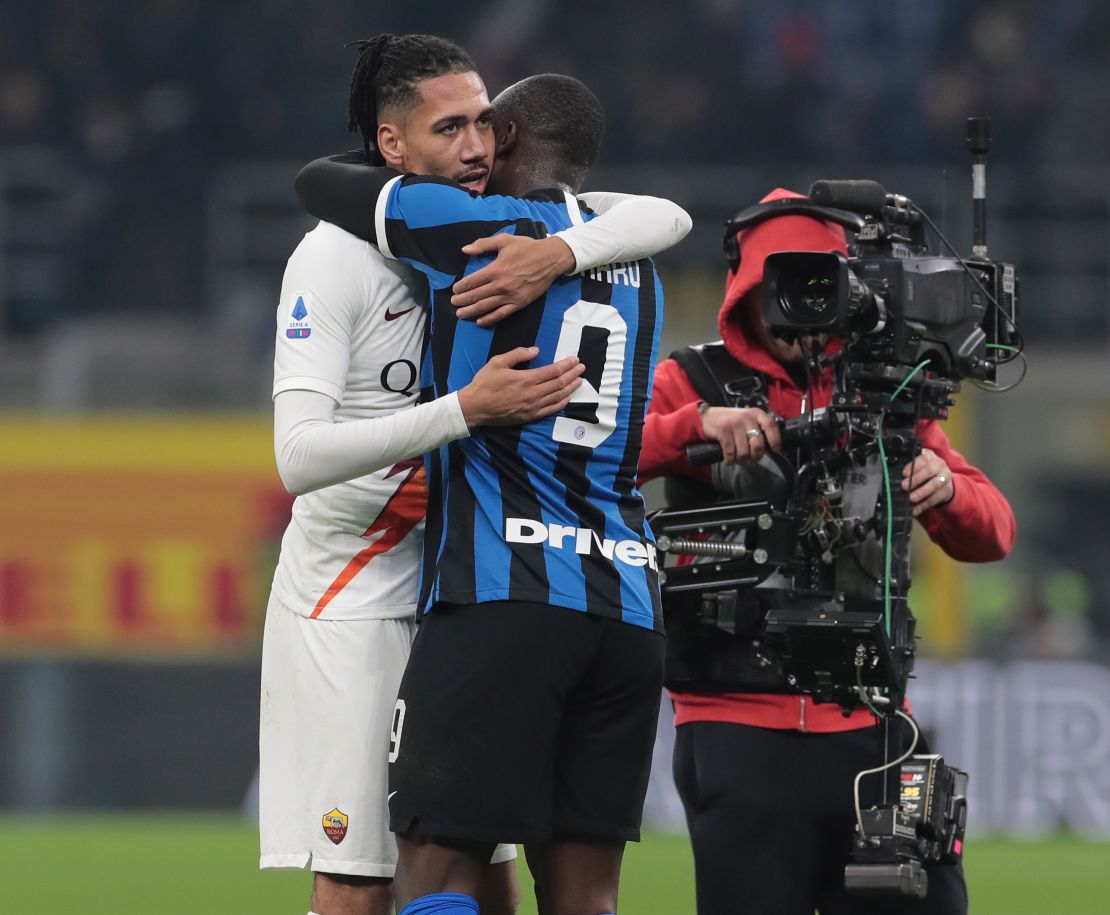 Chris Smalling of AS Roma embraces Romelu Lukaku of FC Internazionale. Smalling and Lukaku played for Manchester United last season.