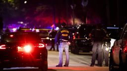 Houston Police Department officers stand by the scene of a shooting in Houston on Saturday, Dec. 7, 2019. A Houston police officer was shot Saturday evening and a suspect was being sought, authorities said. (Marie D. De Jesus/Houston Chronicle via AP)