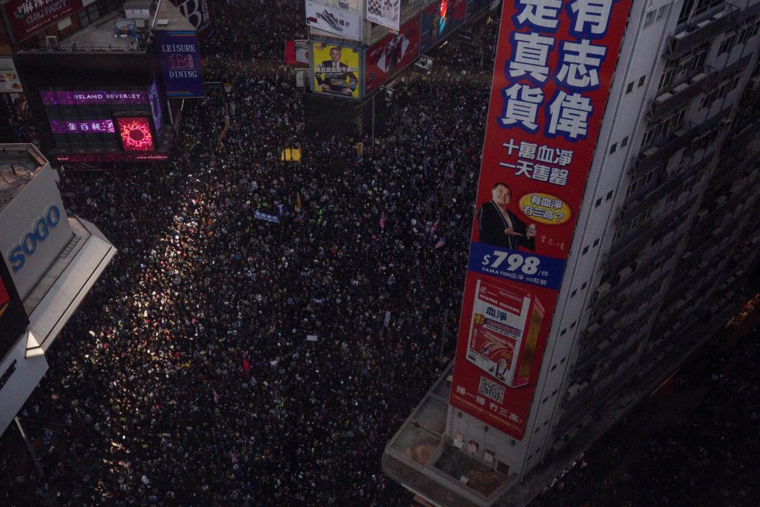 Protesters crowd roads in the Causeway Bay of Hong Kong, on December 8, 2019. 