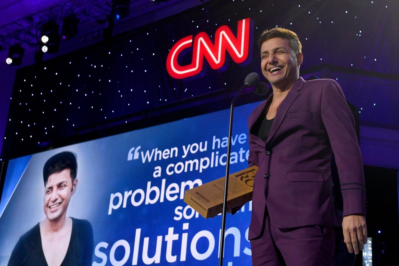 2019 Top 10 CNN Hero Afroz Shah smiles as he accepts his award. Shah began picking up trash from Mumbai's Versova Beach every Sunday morning with a neighbor in October 2015. By October 2018, Versova Beach was finally clean and Shah's cleanups expanded to another beach and other regions of India.