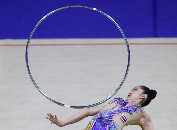 Thailand's Arisa Tanthathoedtham performs during the rhythmic gymnastics hoop competition at the 30th Southeast Asian Games in Manila, Philippines, on Saturday December 7.